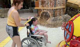 Girl Wheelchair Having Fun